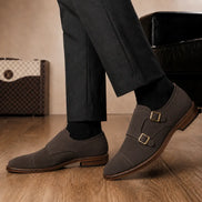 Melodiapelle Maverick Double Monk Brogue in dark brown suede worn with formal trousers, on-feet shot