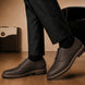 Melodiapelle Max Cap Toe Derby in dark brown leather worn with formal trousers, on-feet shot