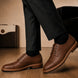 Melodiapelle Max Cap Toe Derby in mole brown nubuck leather worn with formal trousers, on-feet shot