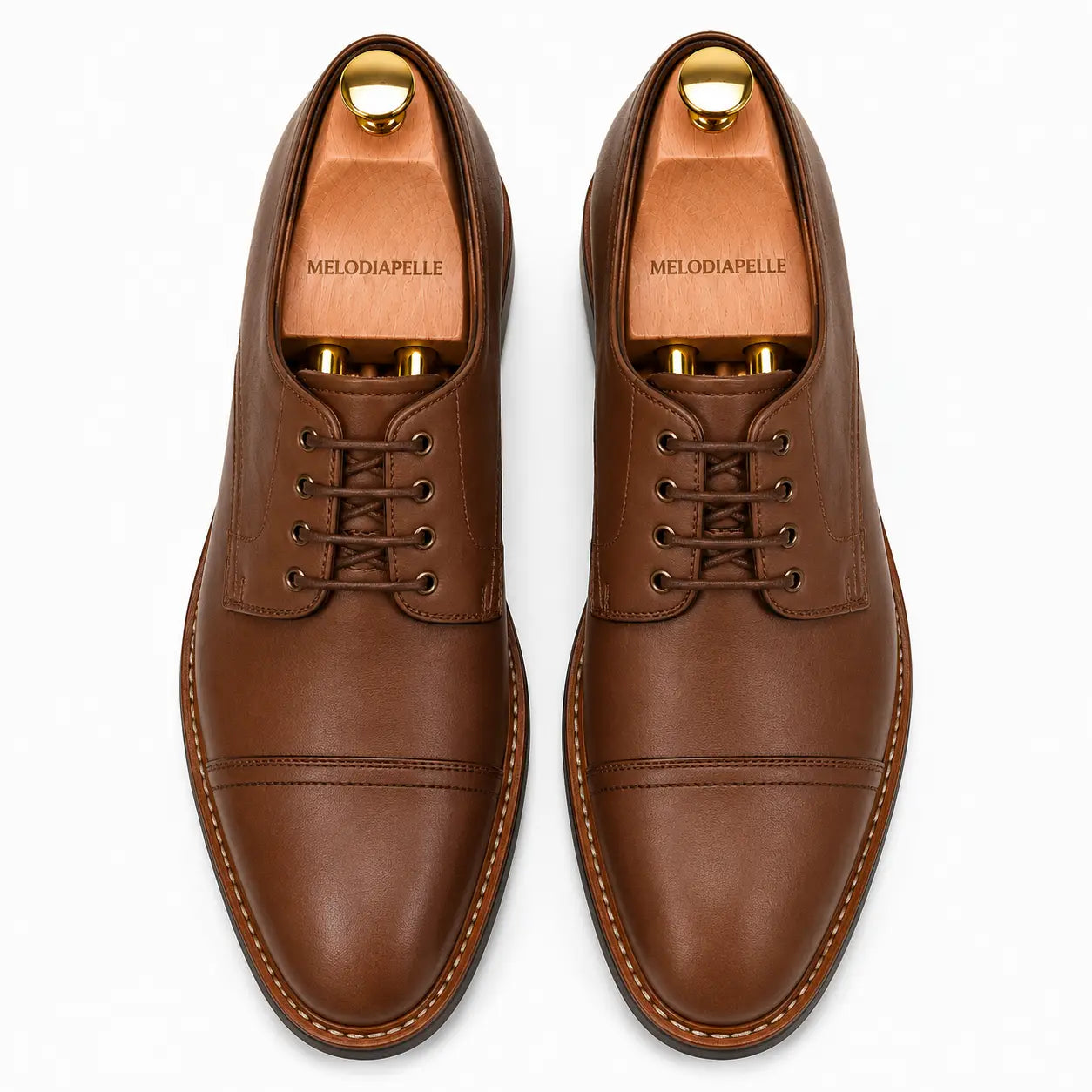 Melodiapelle Max Cap Toe Derby in mole brown nubuck leather, pair top-down view, handcrafted in Agra