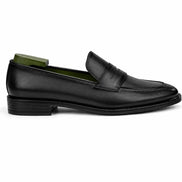 Melodiapelle Maximus Dress Penny Loafer in black leather worn with formal trousers, on-feet shot