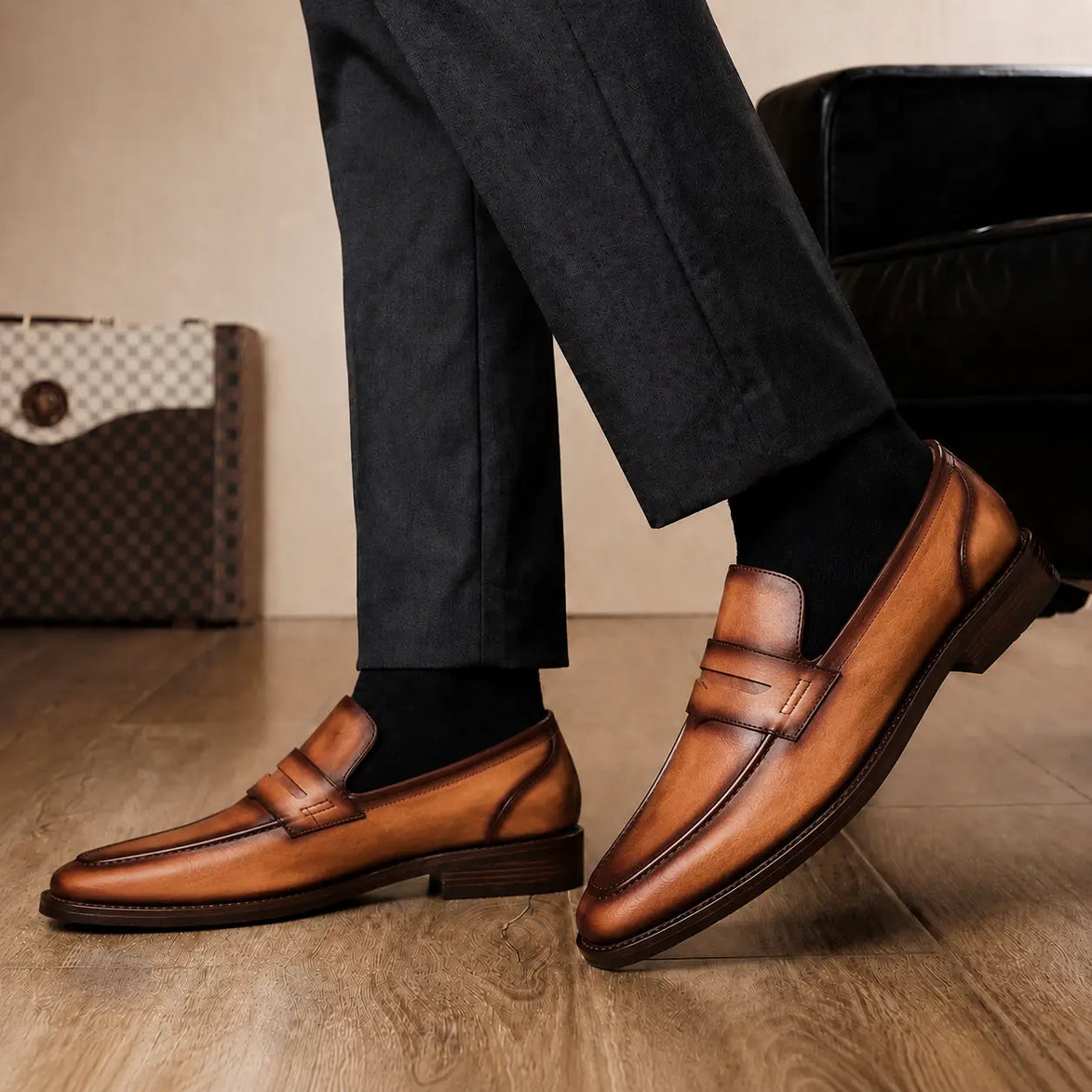 Melodiapelle Maximus Dress Penny Loafer in cognac tan burnished leather worn with formal trousers, on-feet shot