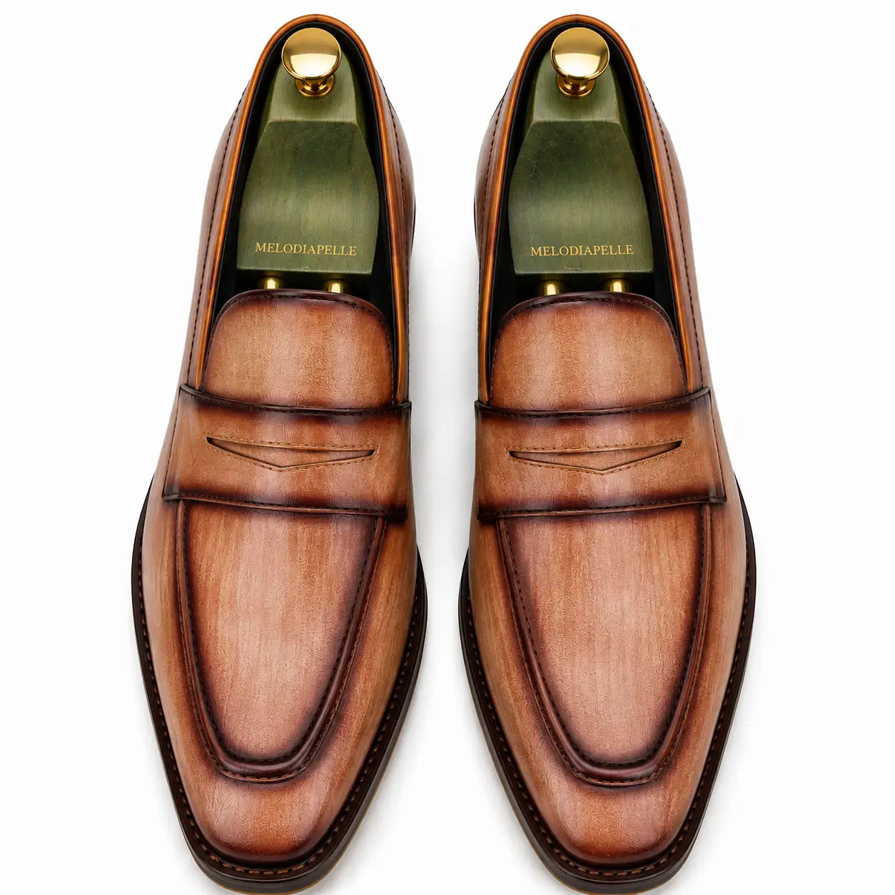 Melodiapelle Maximus Dress Penny Loafer in cognac tan burnished leather, pair top-down view, handcrafted in Agra