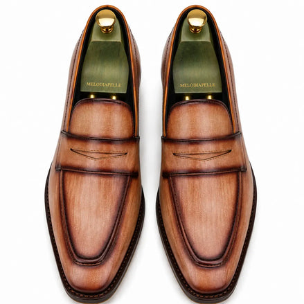 Melodiapelle Maximus Dress Penny Loafer in cognac tan burnished leather, pair top-down view, handcrafted in Agra