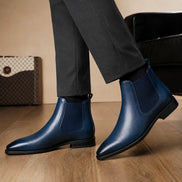 Mazarine Chelsea Boot in steel blue leather worn with trousers, on-feet lifestyle shot