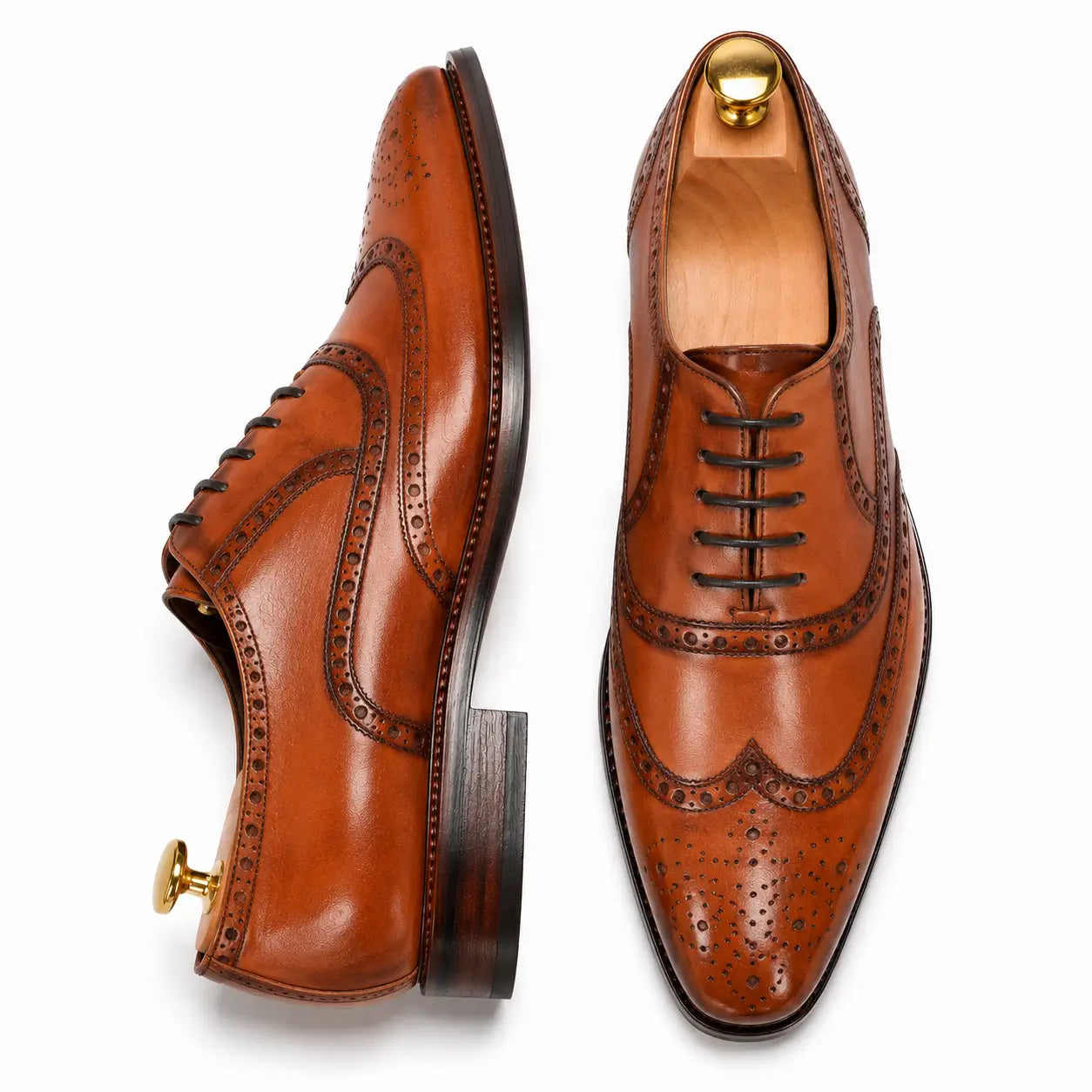 Cognac tan leather wingtip brogue Oxford, three-quarter angle showing heel and brogue detailing