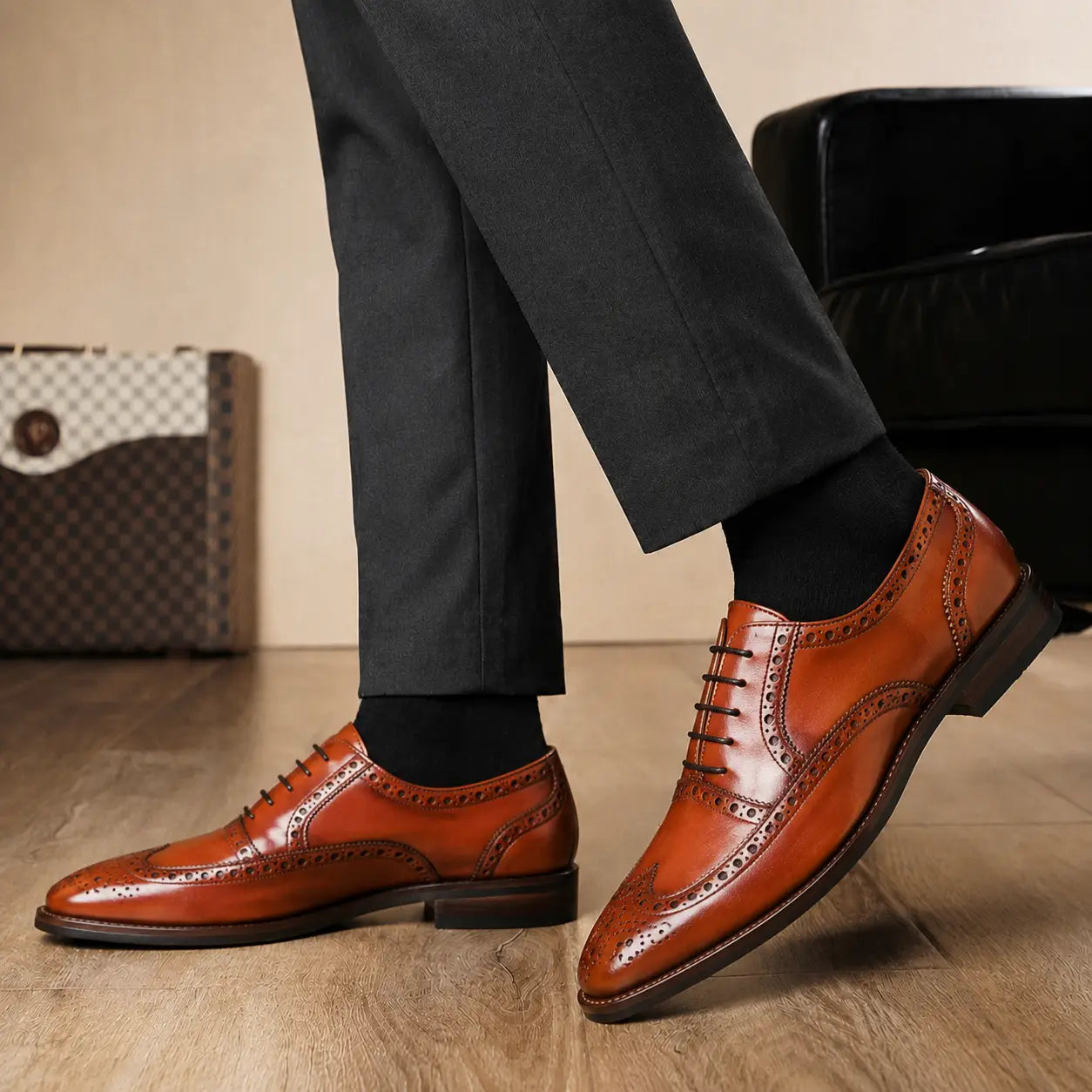 Melodiapelle Mazaro Wingtip Brogue Oxford in cognac tan leather worn with formal trousers, on-feet shot