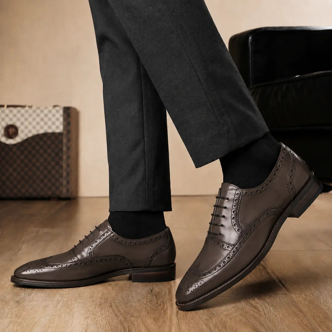 Melodiapelle Mazaro Wingtip Brogue Oxford in dark brown leather worn with formal trousers, on-feet shot