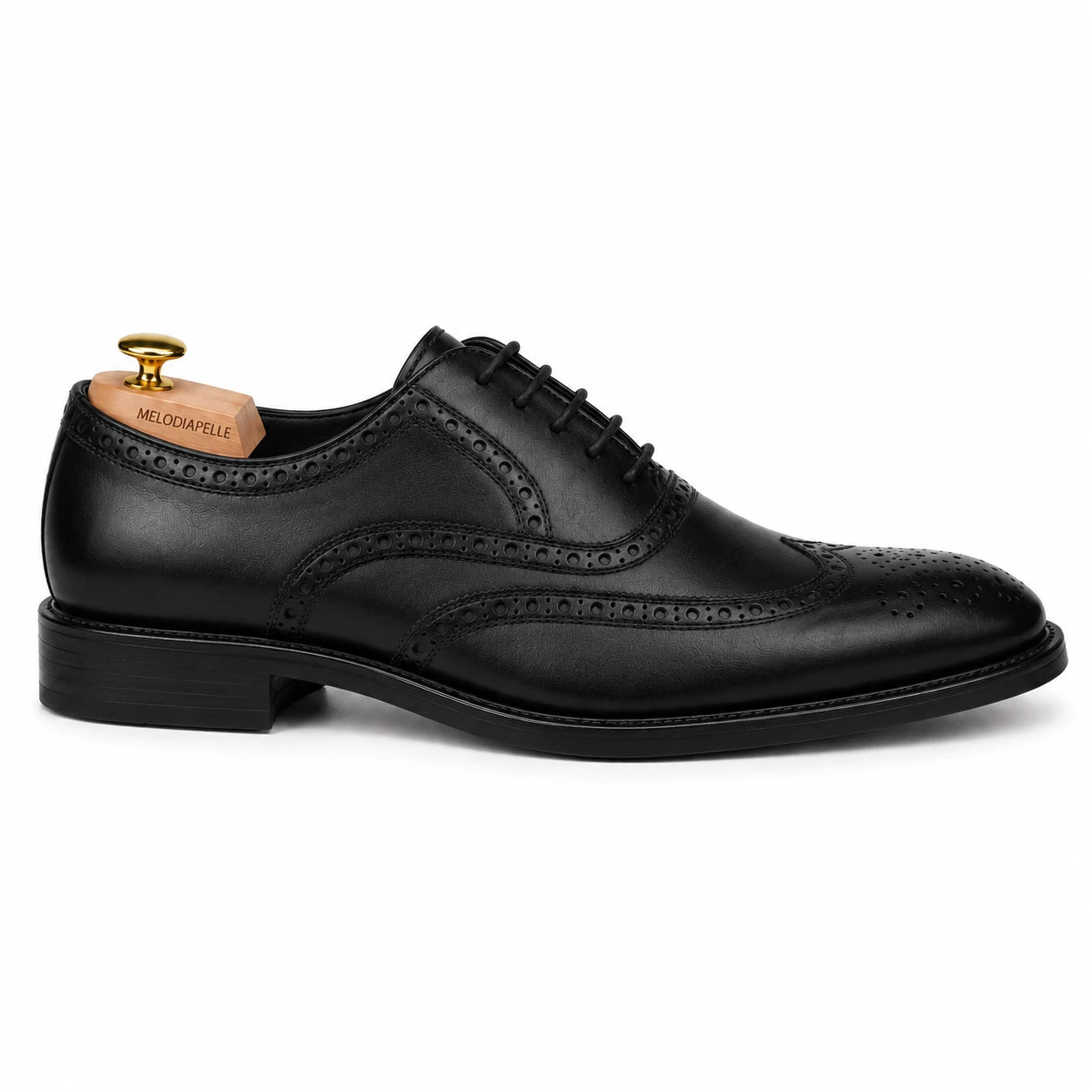 Side profile of the Mazaro Wingtip Brogue Oxford in nero black leather on white background