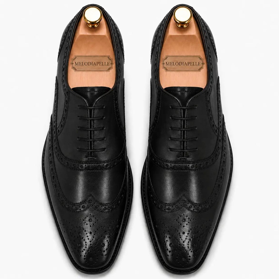 Melodiapelle Mazaro Wingtip Brogue Oxford in nero black leather, pair top-down view, handcrafted in Agra