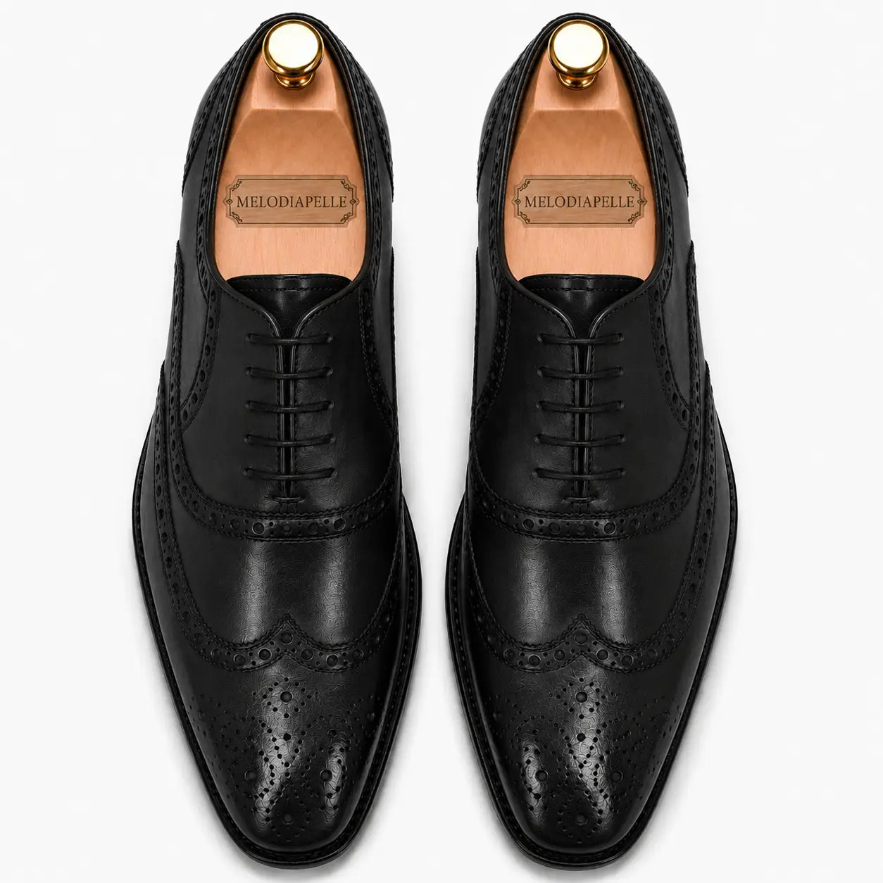 Melodiapelle Mazaro Wingtip Brogue Oxford in nero black leather, pair top-down view, handcrafted in Agra