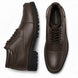 Dark brown leather cap-toe combat boot, three-quarter angle showing heel and sole detailing