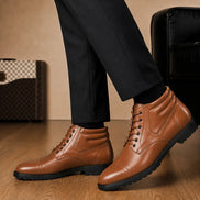 Melodiapelle Mcallen Combat Boot in tan leather worn with trousers, on-feet shot