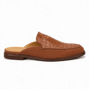Side profile of the Mckinsey Mule in tan croc-embossed leather on white background