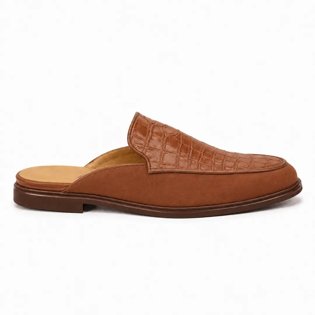 Side profile of the Mckinsey Mule in tan croc-embossed leather on white background