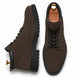 Dark brown suede combat boot, three-quarter angle showing heel and sole detailing