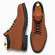 Rust tan leather combat boot, three-quarter angle showing heel and sole detailing