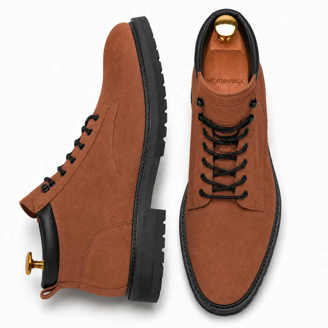 Rust tan leather combat boot, three-quarter angle showing heel and sole detailing