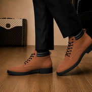 Melodiapelle Meilbourne Combat Boot in rust tan leather worn with trousers, on-feet shot