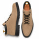 Sand beige suede combat boot, three-quarter angle showing heel and sole detailing