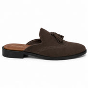 Side profile of the Mendiai Mule in dark brown suede on white background