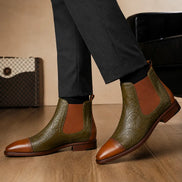 Melodiapelle Merida Floral-Embossed Chelsea Boot in olive and tan leather worn with formal trousers, on-feet shot