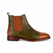 Side profile of the Merida Floral-Embossed Chelsea Boot in olive and tan leather on white background