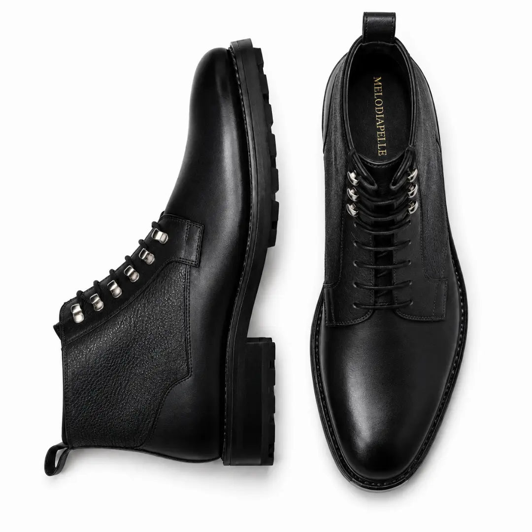Black leather combat boot, three-quarter angle showing heel and sole detailing