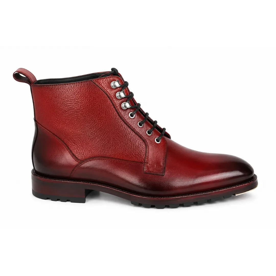 Side profile of the Meridian Combat Boot in burgundy red leather on white background