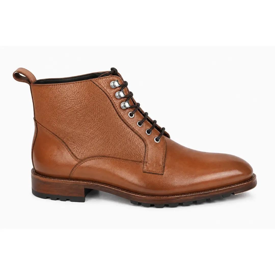 Side profile of the Meridian Combat Boot in tan leather on white background
