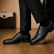 Melodiapelle Meridian Derby Shoes in black leather worn with formal trousers, on-feet shot