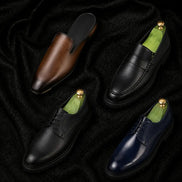 Melodiapelle Meridian Derby Shoes collection in black, tan and dark brown leather, handcrafted plain-toe Derby shoes displayed together