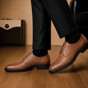Melodiapelle Meridian Derby Shoes in tan leather worn with formal trousers, on-feet shot