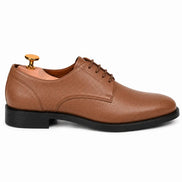Side profile of the Meridian Derby Shoes in tan leather on white background