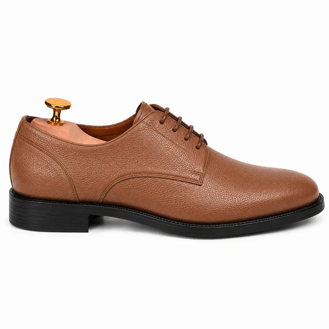 Side profile of the Meridian Derby Shoes in tan leather on white background