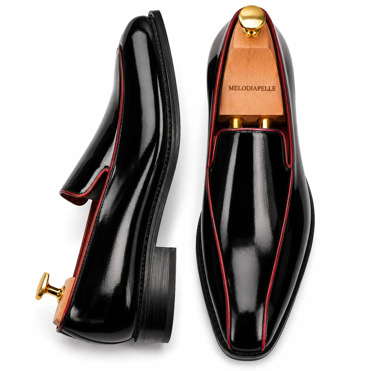 Nero black leather dress loafer with red piping, three-quarter angle showing heel and trim detailing