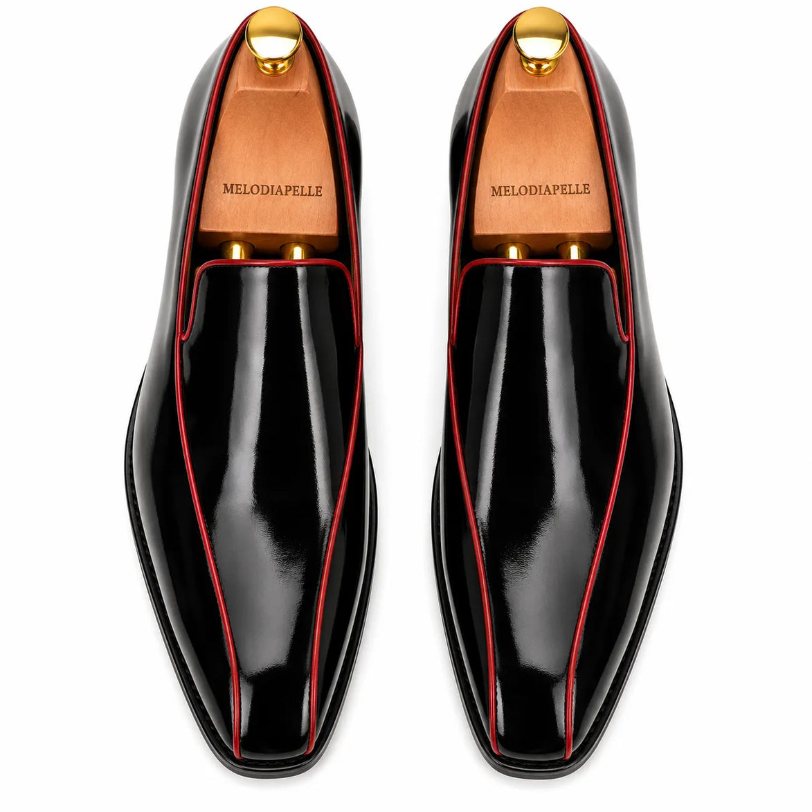 Melodiapelle Merlot Dress Loafer in nero black leather with red piping, pair top-down view, handcrafted in Agra