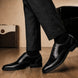 Melodiapelle Meta Semi-Brogue Oxford in nero black leather worn with formal trousers, on-feet shot
