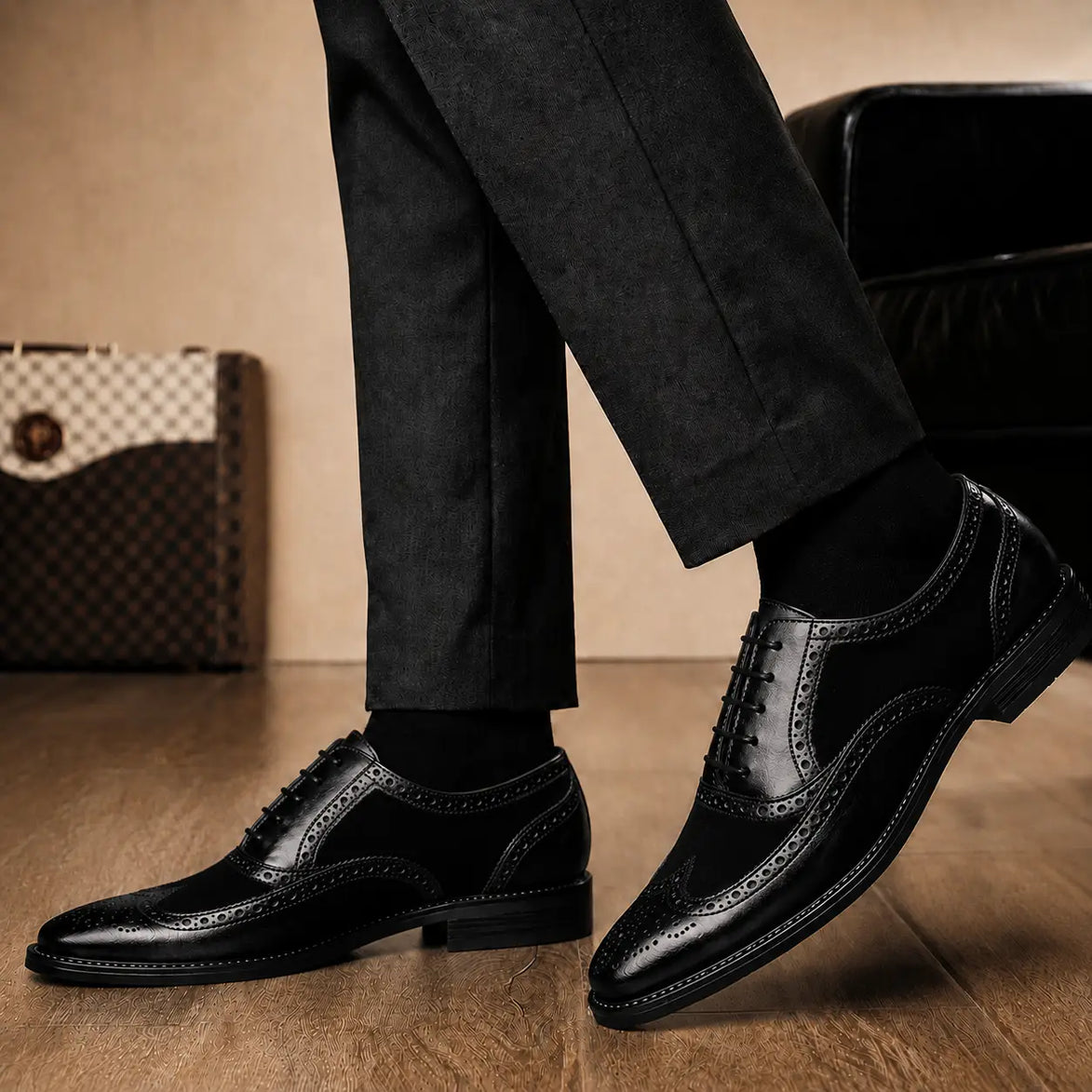 Melodiapelle Meta Semi-Brogue Oxford in nero black leather worn with formal trousers, on-feet shot