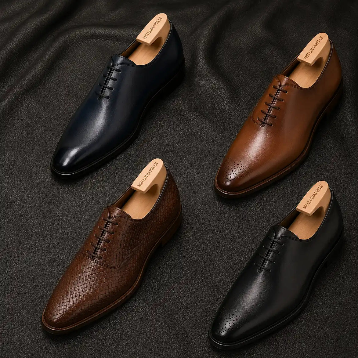 Melodiapelle Meta Wholecut Oxford collection in black, brown and tan leather, handcrafted wholecut Oxford shoes displayed together