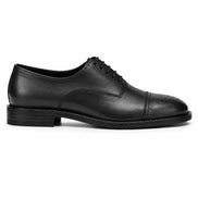 Side profile of the Meta Wholecut Oxford in black leather on white background