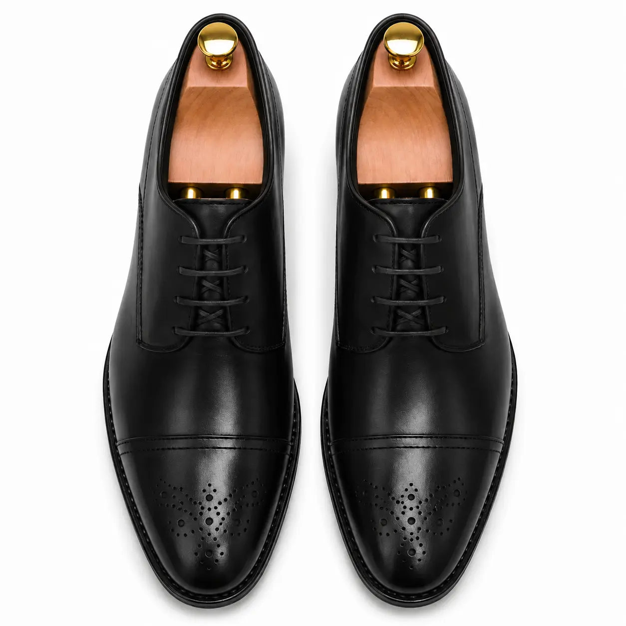 Melodiapelle Meta Wholecut Oxford in black leather, pair top-down view, handcrafted in Agra