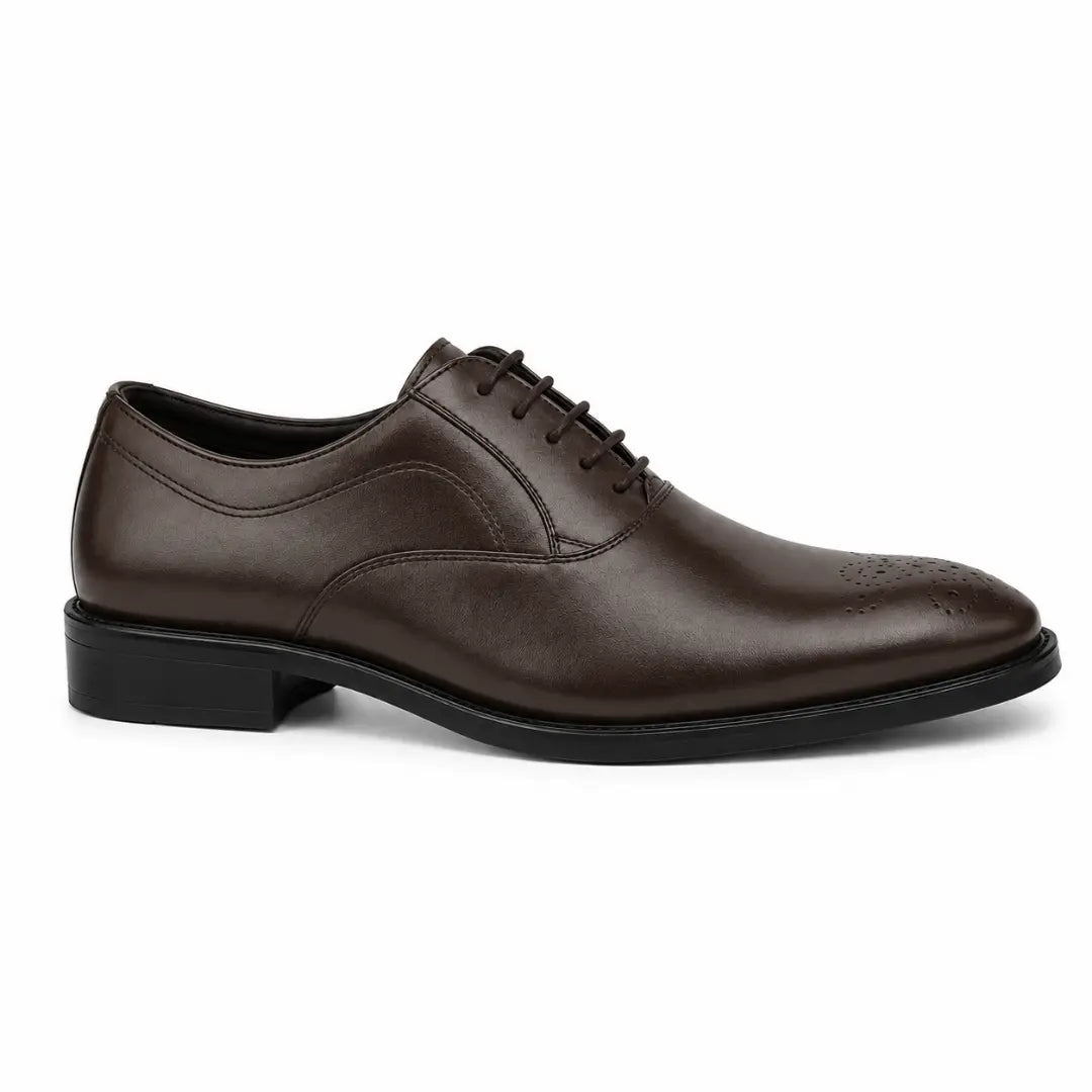 Side profile of the Meta Wholecut Oxford in brown leather on white background