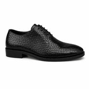 Side profile of the Meta Wholecut Oxford in black croc-embossed leather on white background