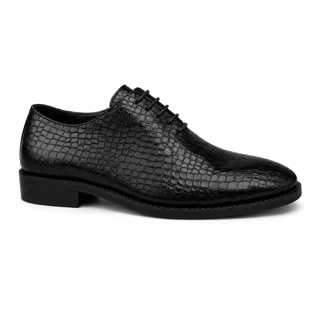 Side profile of the Meta Wholecut Oxford in black croc-embossed leather on white background