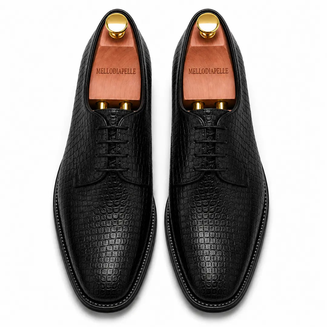 Melodiapelle Meta Wholecut Oxford in black croc-embossed leather, pair top-down view, handcrafted in Agra