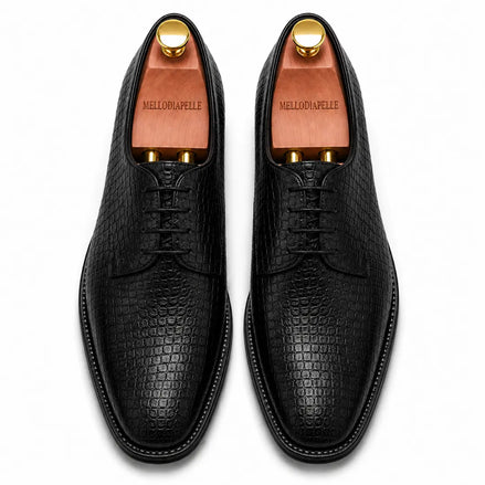 Melodiapelle Meta Wholecut Oxford in black croc-embossed leather, pair top-down view, handcrafted in Agra