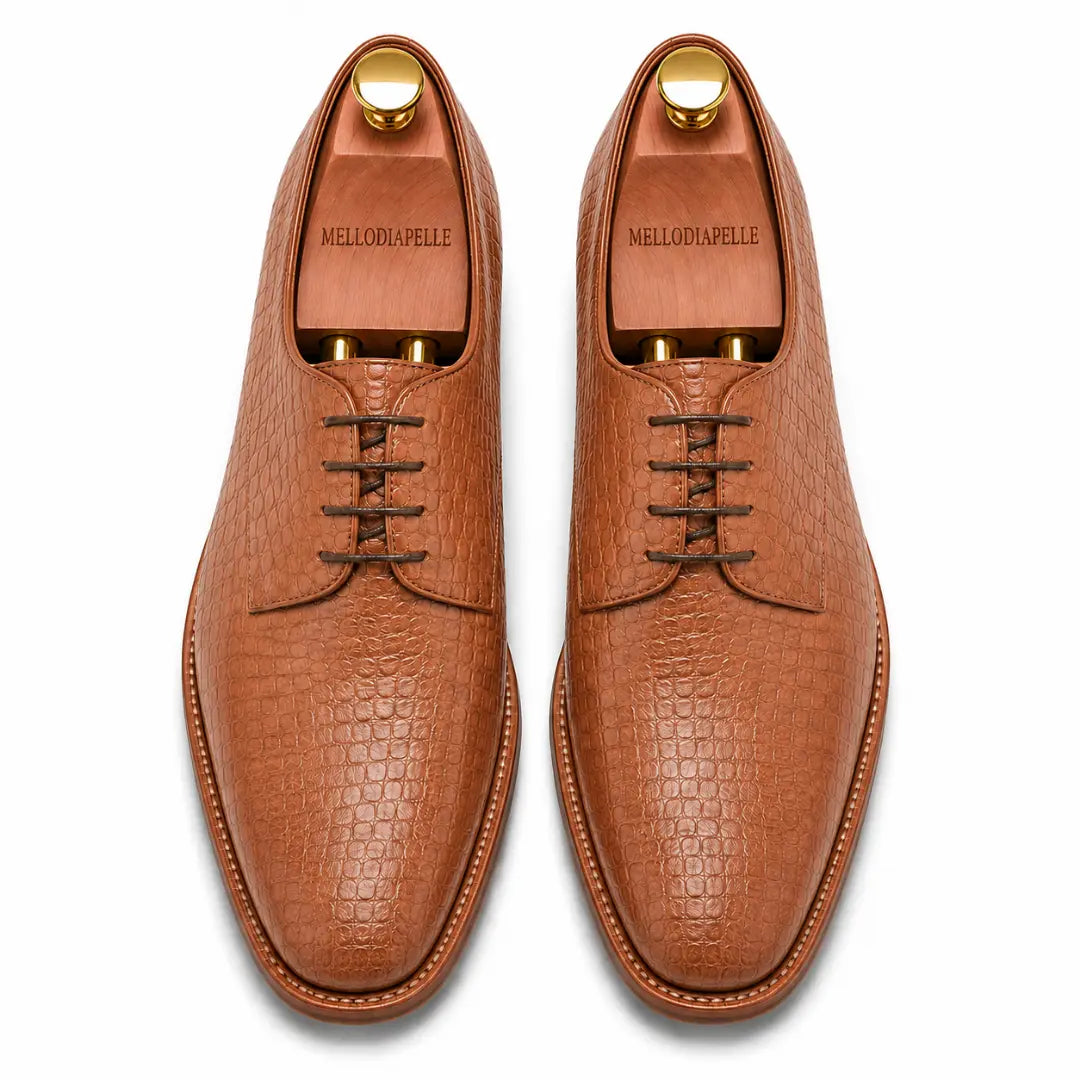 Melodiapelle Meta Wholecut Oxford in tan croc-embossed leather, pair top-down view, handcrafted in Agra