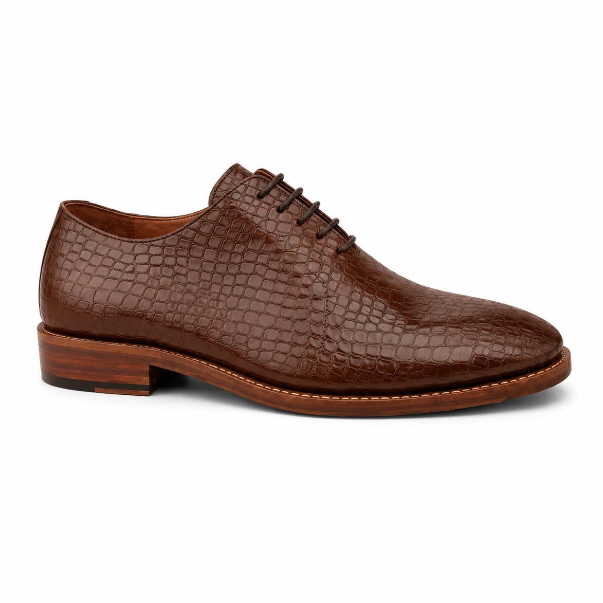 Side profile of the Meta Wholecut Oxford in taupe brown croc-embossed leather on white background