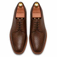 Melodiapelle Meta Wholecut Oxford in taupe brown croc-embossed leather, pair top-down view, handcrafted in Agra